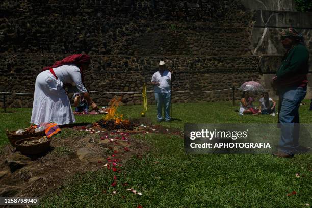 Members of the Mayan council next to the altar of fire during a Summer Solstice celebration ceremony organized by the Mayan council at the Tazumal...