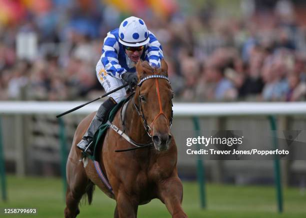 Jockey Adrian Nicholls riding Evens and Odds winning the Best Odds Guaranteed At Stan James Stakes at Newmarket Rowley Mile, 3rd May 2009.