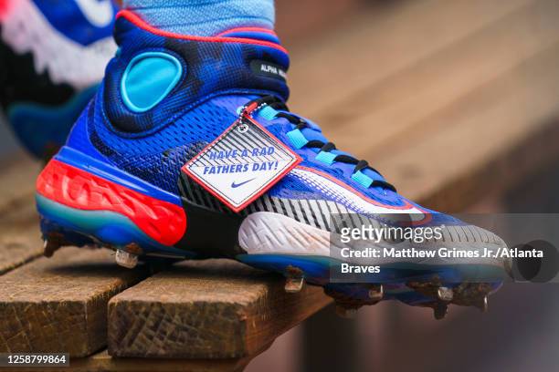 Ronald Acuna Jr. #13 of the Atlanta Braves wears Father's day themed cleats during the game against the Colorado Rockies at Truist Park on June 18,...