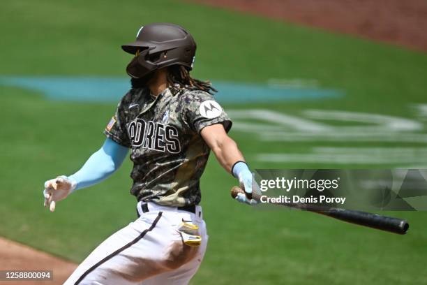 Fernando Tatis Jr. #23 of the San Diego Padres hits a single during the third inning against the Tampa Bay Rays on June 18, 2023 at Petco Park in San...