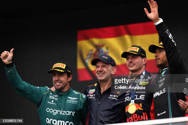 Second place winner Fernando Alonso of Spain and Aston Martin, the Chief Technical Officer of Red Bull Racing Adrian Newey , first place winner Max...