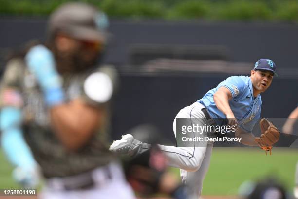 Fernando Tatis Jr. #23 of the San Diego Padres is hit with a pitch thrown by Yonny Chirinos of the Tampa Bay Rays during the first inning on June 18,...