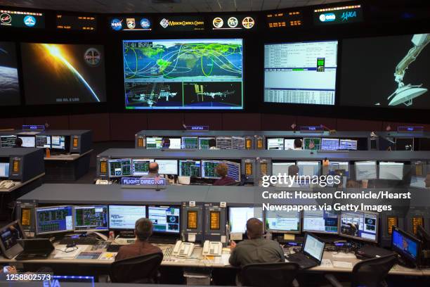 Controllers work in The International Space Station control room at NASA's Mission Control Center at the Johnson Space Center on Wednesday, June 15...
