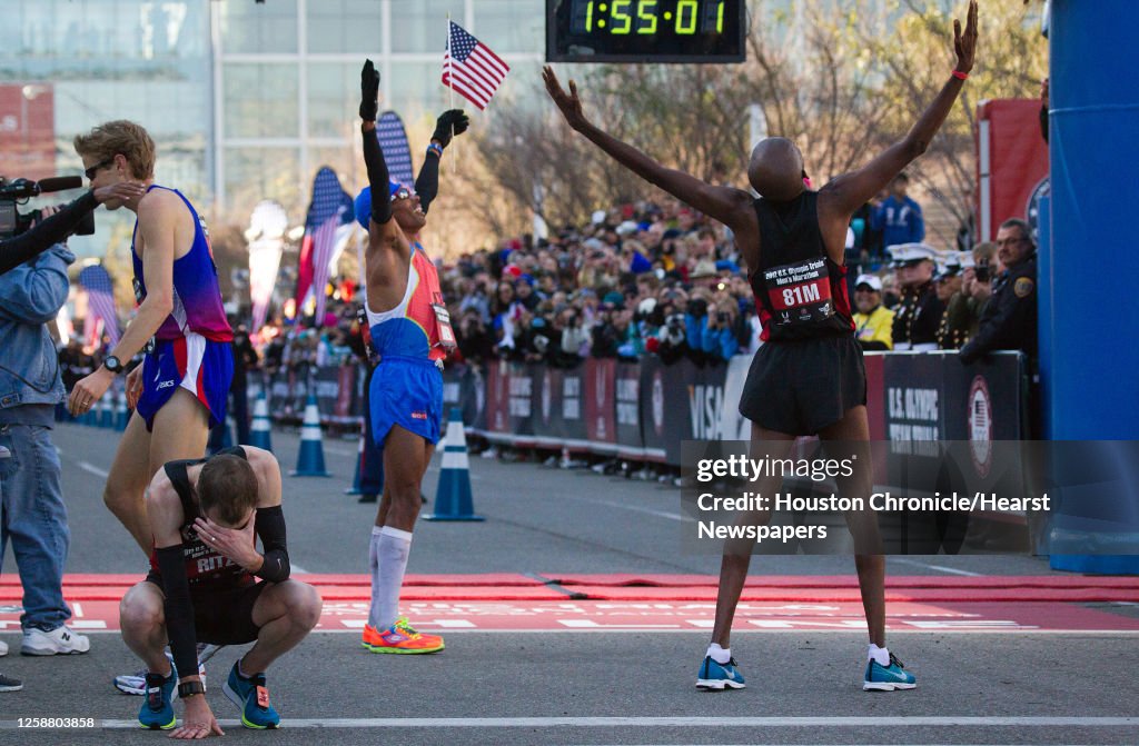 Addy Rizenhein Dathan Ritzenhein holds his head as Ryan Hall, left, and Meb... News ...