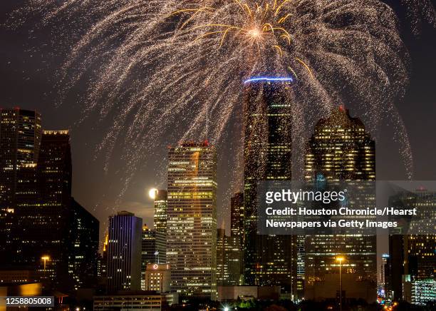 Fireworks explode over the downtown skyline during the Freedom Over Texas annual Fourth of July celebration on Wednesday, July 4 in Houston.