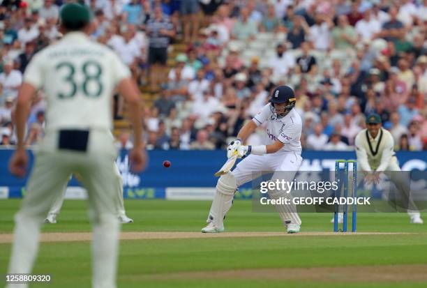 England's Joe Root plays a shot on day four of the first Ashes cricket Test match between England and Australia at Edgbaston in Birmingham, central...