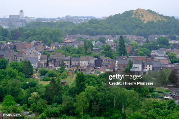 Dampremy section of the Belgian city of Charleroi and the culm bank 'des Piges' are seen from 'Saint-Theodore Est' Spoil tip on June 18, 2023 in...