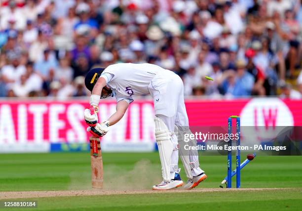 England's Ollie Pope is bowled by Australia's Pat Cummins during day four of the first Ashes test match at Edgbaston, Birmingham. Picture date:...