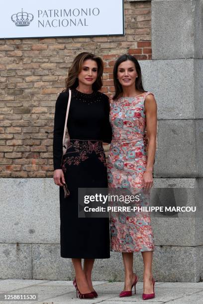 Queen Letizia of Spain welcomes Jordania's Queen Rania during a visit in Madrid on June 19, 2023.