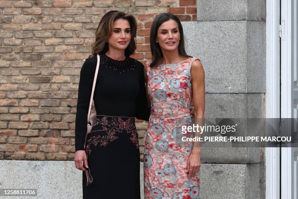 Queen Letizia of Spain welcomes Jordania's Queen Rania during a visit in Madrid on June 19, 2023.