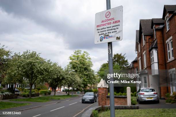 Alcohol restricted area sign in Moseley on 17th May 2023 in Birmingham, United Kingdom. Generally speaking in the UK, if you are 18 years of age or...