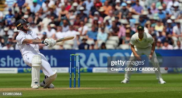 England's captain Ben Stokes plays a shot on day four of the first Ashes cricket Test match between England and Australia at Edgbaston in Birmingham,...