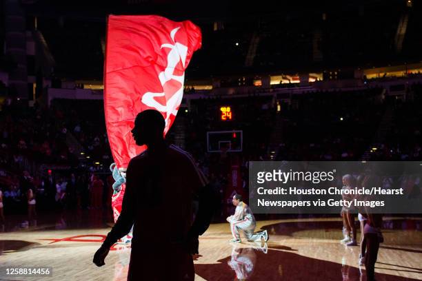 Houston Rockets shooting guard James Anderson is seen in silohuette before an NBA basketball game against the Portland Trail Blazers at Toyota Center...