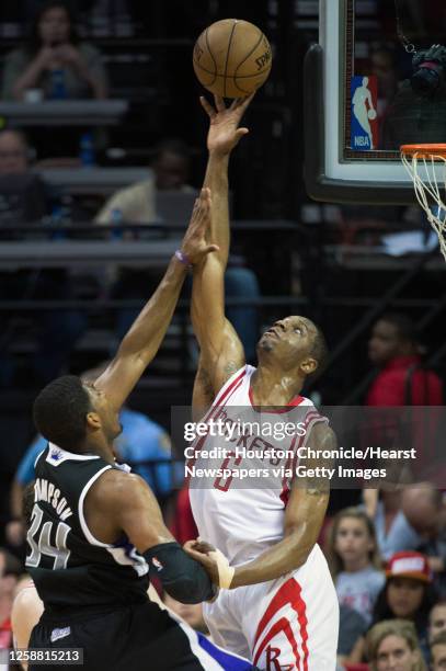 Houston Rockets power forward Terrence Jones blocks a shot by Sacramento Kings power forward Jason Thompson during the first half of an NBA...