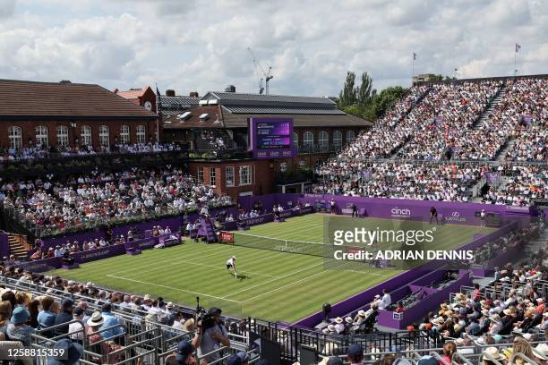 Serbia's Miomir Kecmanovic plays a forehand return to Britain's Cameron Norrie during their men's single tennis match on Day 3 of the Cinch ATP...