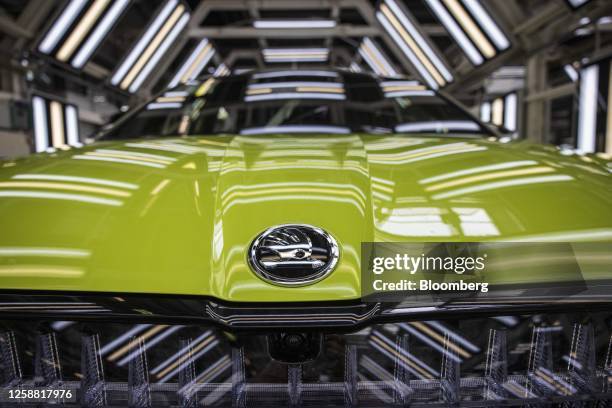 Skoda Enyaq electric vehicle in an inspection tunnel on the production line at the Skoda Auto AS manufacturing plant in Mlada Boleslav, Czech...