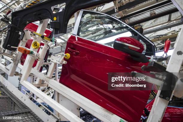 Car doors for Skoda vehicles on the production line at the Skoda Auto AS manufacturing plant in Mlada Boleslav, Czech Republic, on Monday, June 19,...