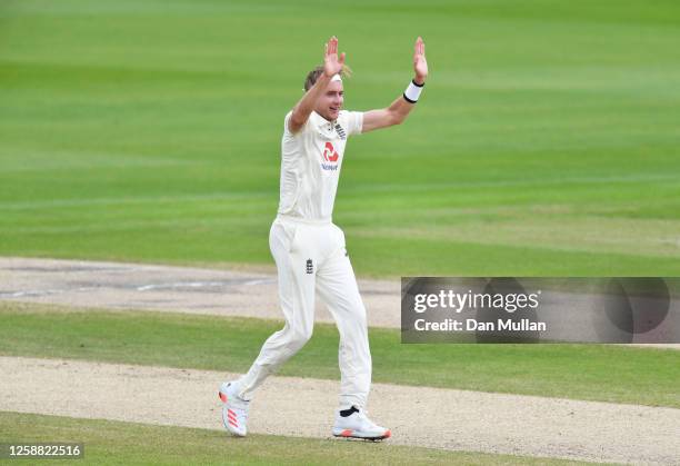 Stuart Broad of England celebrates after taking the wicket of Rahkeem Cornwall of West Indies during Day Three of the Ruth Strauss Foundation Test,...