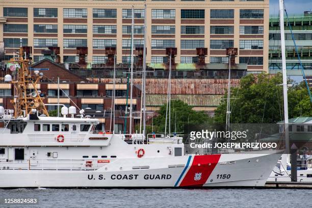 Coast Guard vessel sits in port in Boston Harbor across from the US Coast Guard Station Boston in Boston, Massachusetts, on June 19, 2023. A...