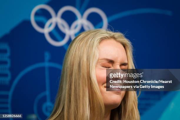 Alpine skier Lindsey Vonn reacts to a question about her apperance in the Sports Illustrated swimsuit issue during a press conference in advance of...