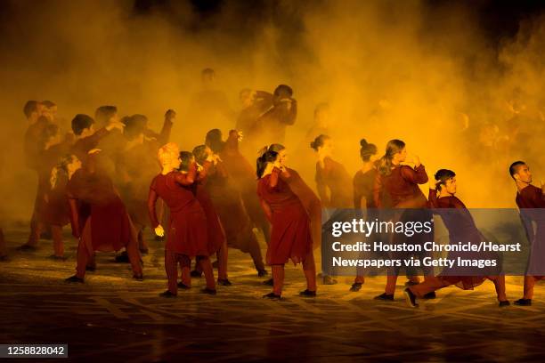 Performers dance during the opening ceremony for the 2012 London Olympics on Friday, July 27, 2012.