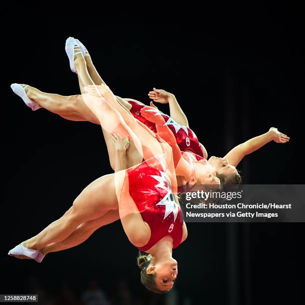 Canada's Rosannagh Maclennan is seen in a multiple exposure photograph as she competes in women's trampoline at the 2012 London Olympics on Saturday,...