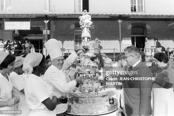 - This picture taken on October 13, 1981 in Plaisir shows French master pastry chef Gaston Lenotre sharing a cake. Lenotre died at the age of 88....