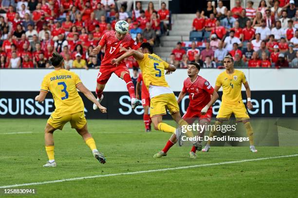 Radu Dragusin of Romania, Ruben Vargas of Switzerland, Ionut Nedelcearu of Romania, Amdouni Zeki of Switzerland and Cristian Manea of Romania battle...