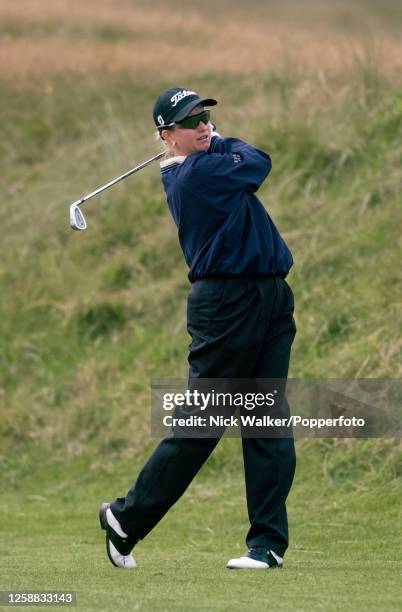 Karrie Webb of Australia plays an iron shot on the 3rd hole during the third round of the Women's British Open at Royal Birkdale Golf Club on August...