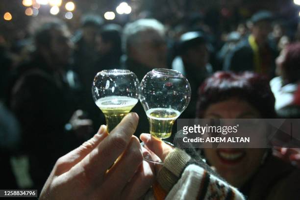 Turkish Critics of the new rules of Turkey's Justice and Development Party, or AKP, on alcohol sales, take part in a demonstration organized through...