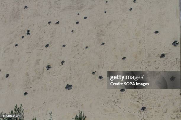 Bullet Riddled Square Bullet Hole Wall Photos and Premium High Res Pictures - Getty Images