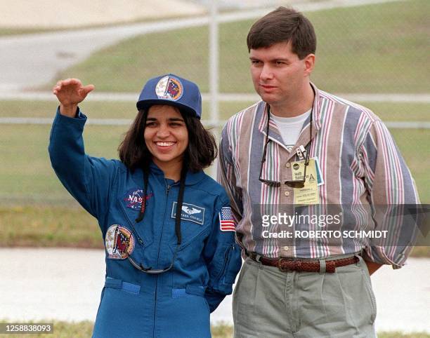 This file photo dated 18 November 1997 shows Indian-American astronaut Kalpana Chawla waving to well wishers and family members during a photo...