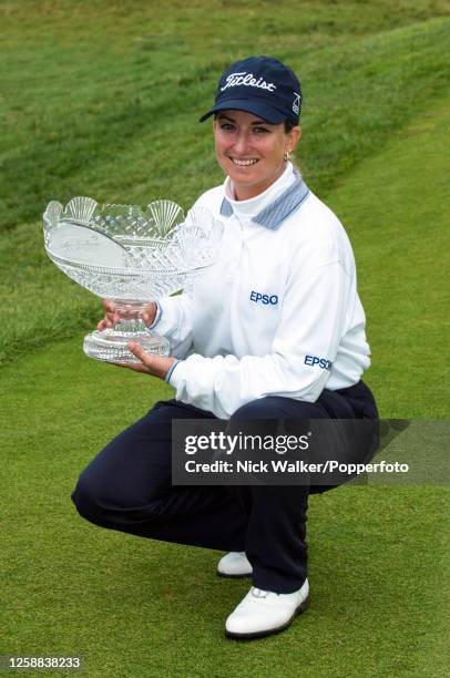 Karrie Webb of Australia celebrates with the trophy after winning the Women's British Open held at the Ailsa Course of Turnberry Golf Club on August...