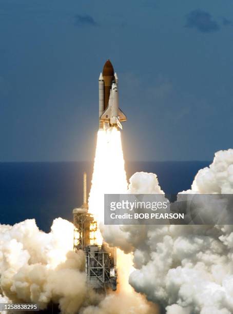 The space shuttle Discovery is seen as it lifts off from launch pad 39B at Kennedy Space Center in Florida 04 July 2006. The Discovery shuttle...