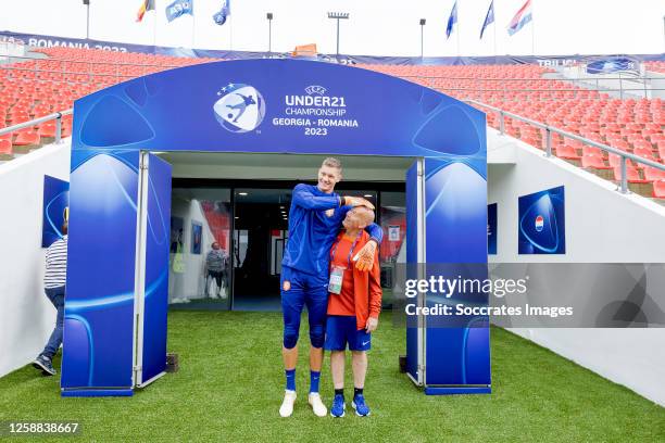 Kjell Scherpen of Holland U21, Kit manager Rob Adelaar of Holland U21 during the U21 MenTraining Holland U21 at the Meshki Stadium on June 20, 2023...