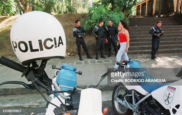Costa Rican police stand guard 31 January outside the election tribunal building in San Jose one day prior to the country's presidential election....