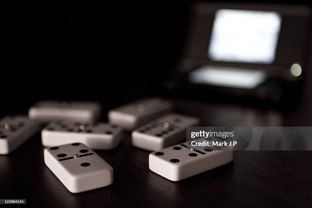 Dominoes vs video games