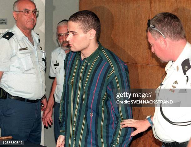 Jewish American teenager Samuel Sheinbein enters the Tel Aviv districts court 02 September 1999 where he admitted to the murder of a Hispanic youth...