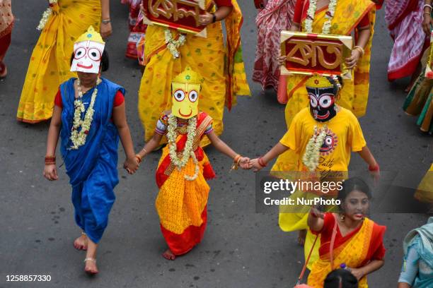 Children are seen dressed as Jagannath , Subhadra and Balaram during annual rathyatra festival in Kolkata , India , on 20 June 2023 . Kolkata ISCKON...