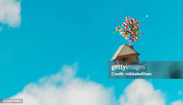 house flys away up in the air thanks to helium balloons - up in the air stock pictures, royalty-free photos & images