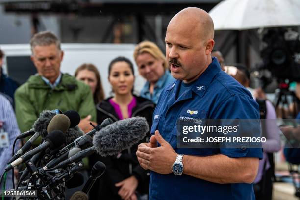 Coast Guard Captain Jamie Frederick speaks during a press conference about the search efforts for the submersible that went missing near the wreck of...