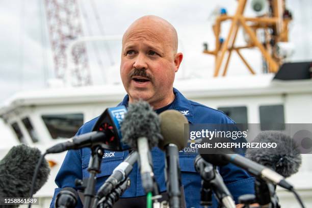 Coast Guard Captain Jamie Frederick speaks during a press conference about the search efforts for the submersible that went missing near the wreck of...