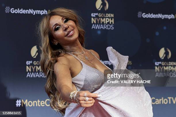 French socialite Cathy Guetta poses during a photocall for the Golden Nymph Awards ceremony of the 62nd Monte-Carlo Television Festival in the...
