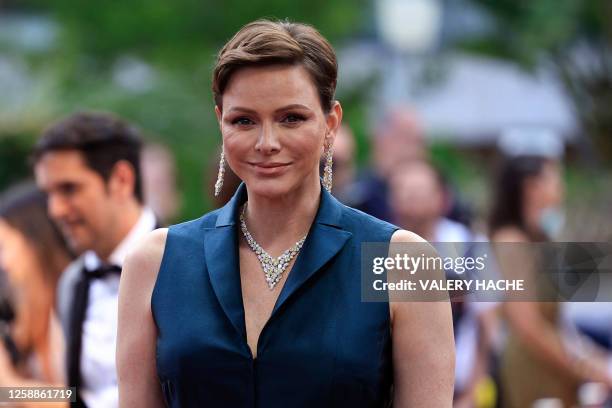 Princess Charlene of Monaco smiles as she arrives for a photocall as part of the Golden Nymph Awards ceremony of the 62nd Monte-Carlo Television...