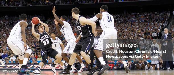 Butler guard Chase Stigall looks for room to move against Connecticut during the first half of the NCAA National Championship at Reliant Stadium on...