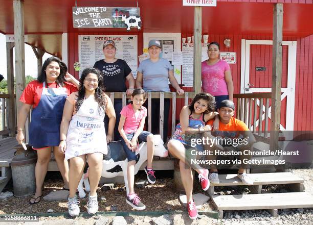 Sisters Laura Muñoz and Diana Escareño on the back row, owners of The Ice Barn, with their employees at 15910 Old Richmond Road , in an area known as...