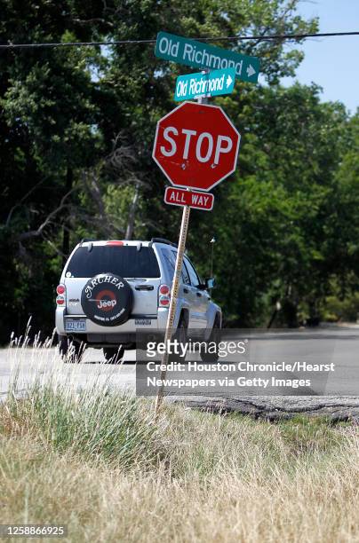 Car crosses an intersection at Old Richmond and Boss Gaston Road in an area known as Four Corners, Tuesday, May 24 in Sugarland, in Fort Bend County....