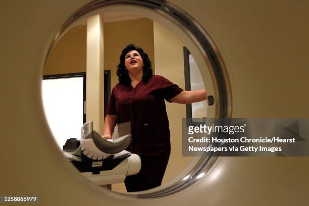 Kristi Moncrief, Registered MRI technician for Gulf Coast Veterinary Neurology and Neurosurgery, stands in the CAT scan room, Wednesday, June 1,...
