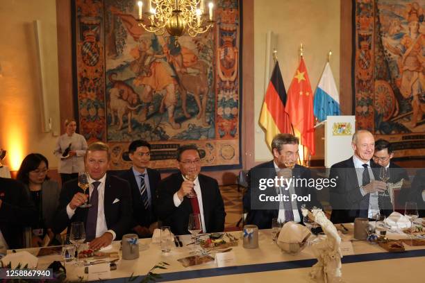 State Premier of Bavaria Markus Soeder and Chinese Premier Li Qiang attend the festive dinner in the Kaisersaal of Munich Residence on June 20, 2023...