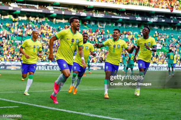 Lucas Paqueta of Brazil celebrates after scoring his team's first goal with teammates during the International Friendly match betwen Brazil and...